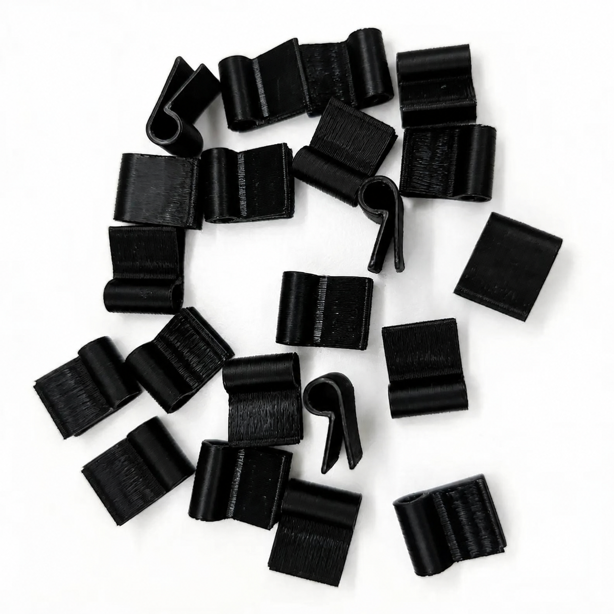 Twenty black automotive dashboard wiring cable clips