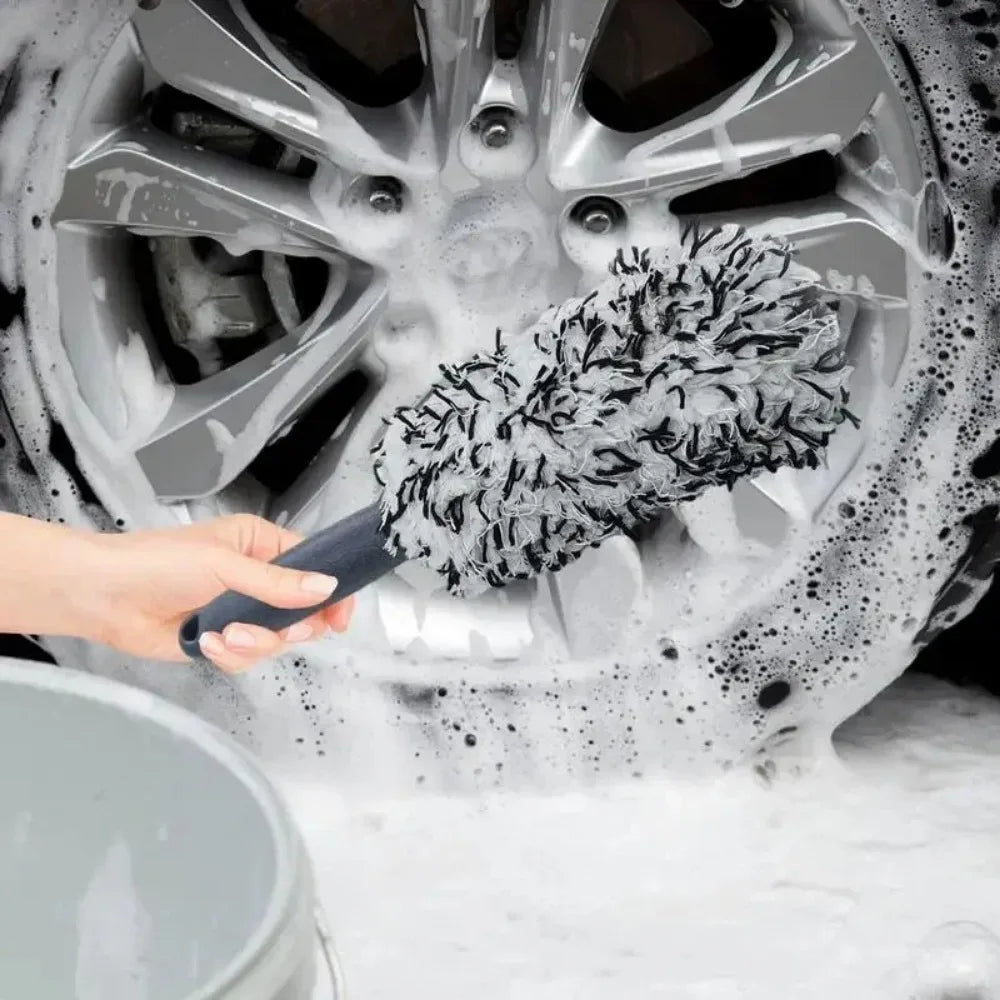 LEAP grey plush wheel brush cleaning an alloy wheel