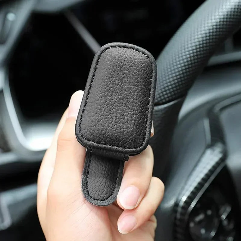 LEAP black magnetic sunglasses holder shown in a car interior