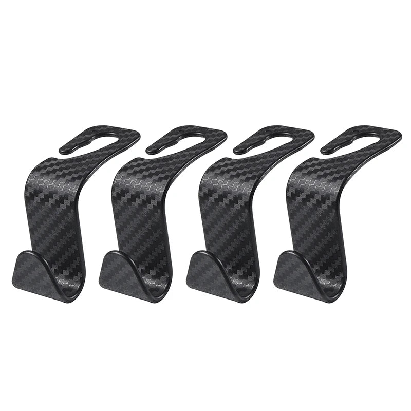 Set of four LEAP black carbon-fibre pattern headrest hooks
