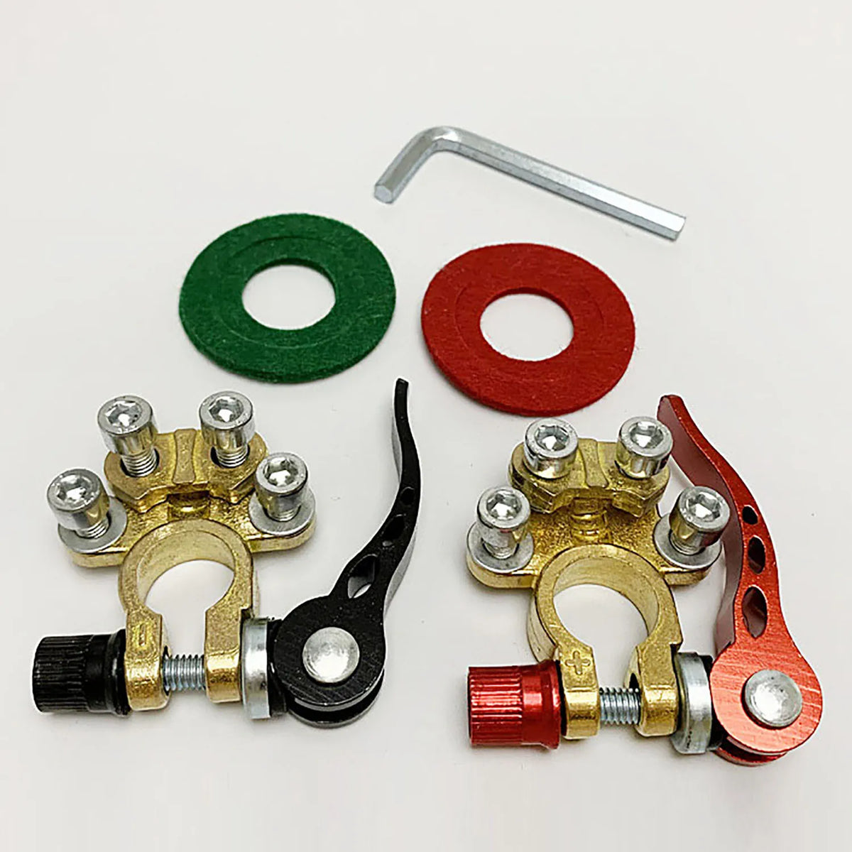 Pair of brass quick-release battery terminals with red and black levers