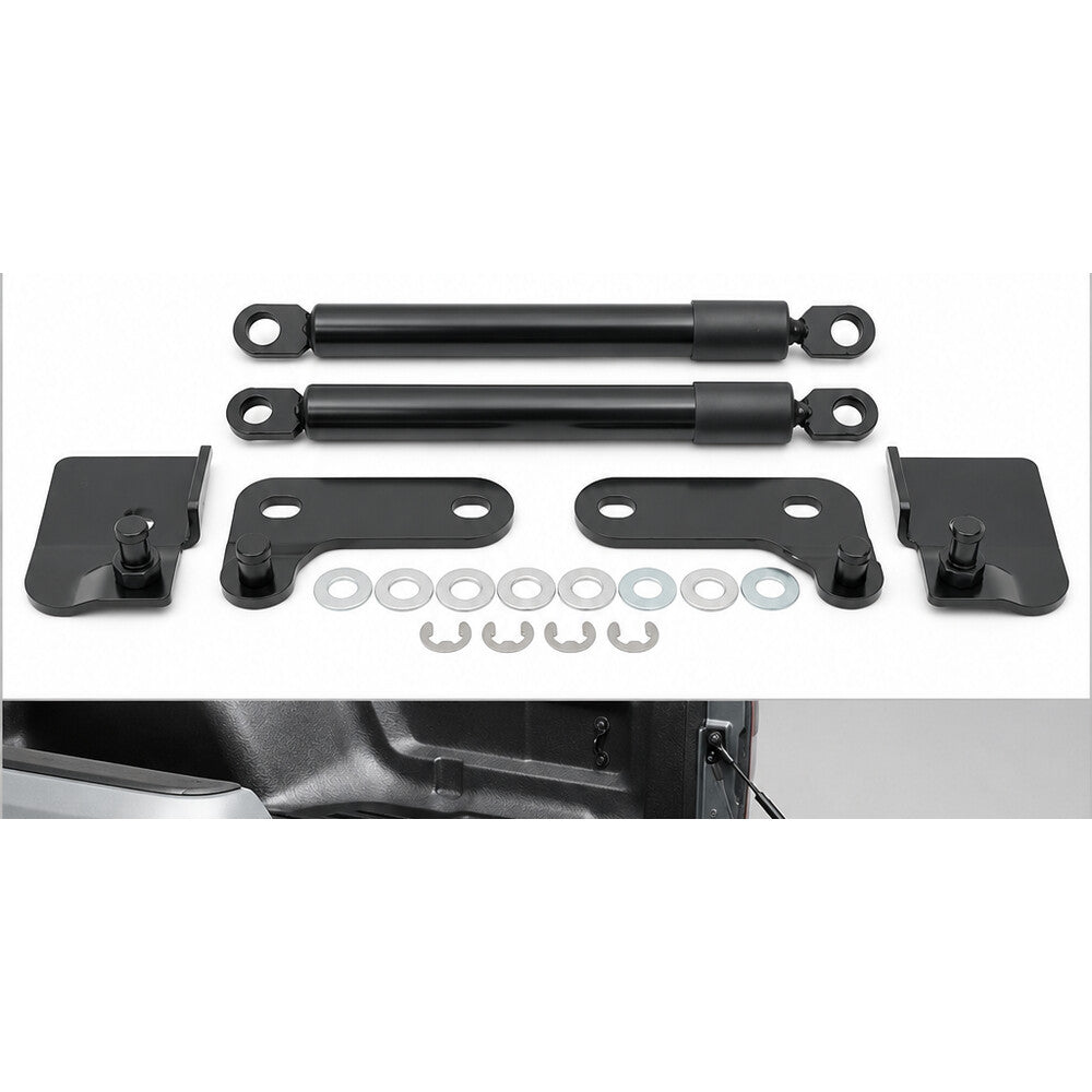 Two black tailgate gas struts with mounting brackets and hardware